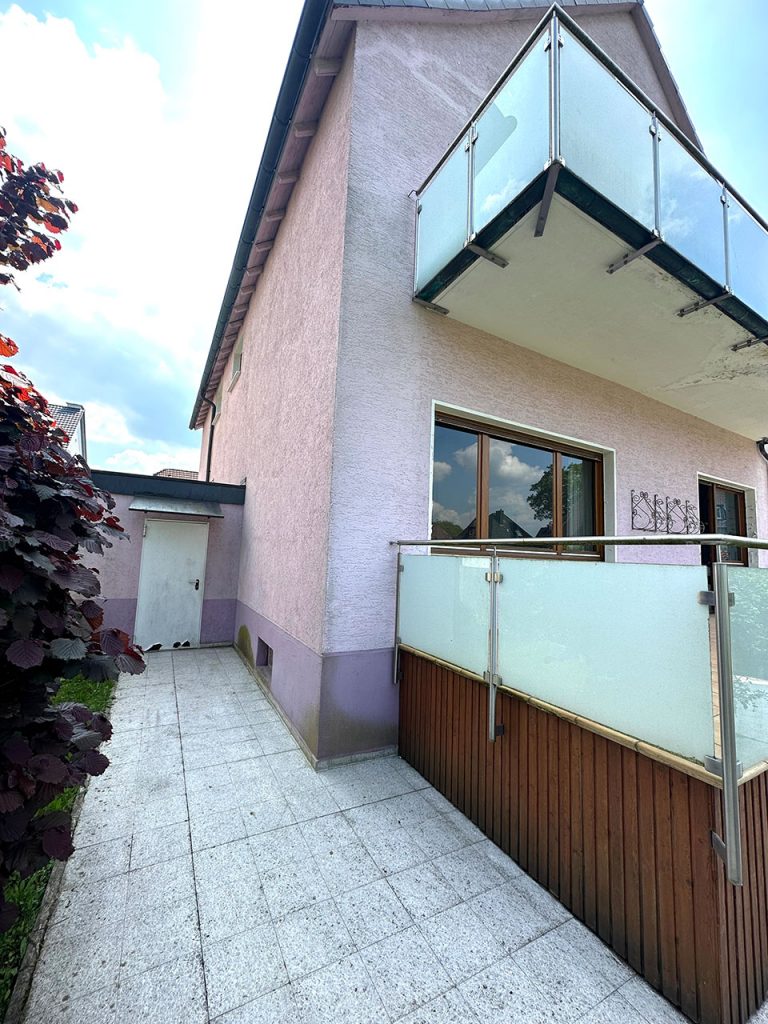 Schöneaussicht Immobilien - Einfamilienhaus Dortmund Zugang Garage